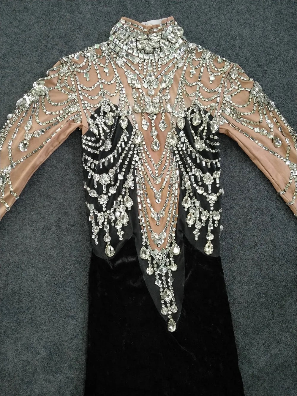Elegantly draped black gown
